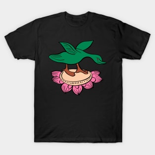 Flying duck landing on a lotus T-Shirt